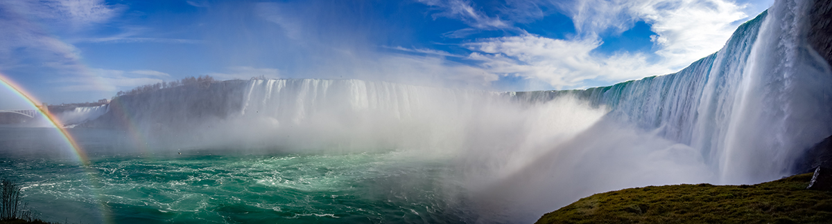 Canadian Niagara Falls panorama with a rainbow